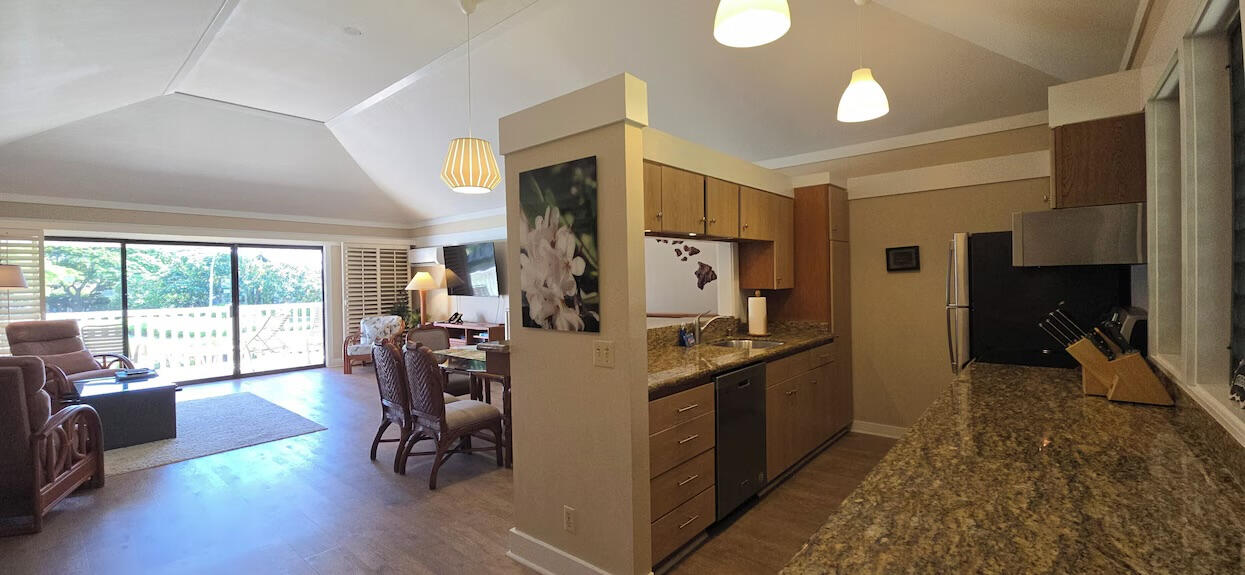 Full kitchen with new stainless steel appliances and an open concept